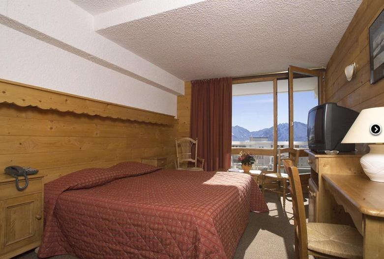Hotel Le Dome Alpe d'Huez Стая снимка